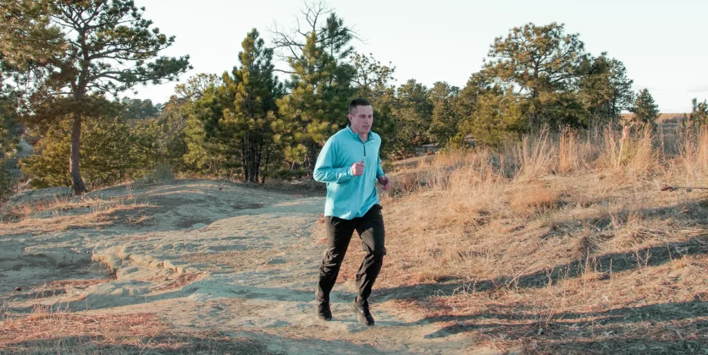 Runners running in Billings, a picture of a runner on the rimrocks